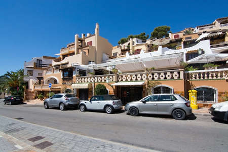 CALA FORNELLS, MALLORCA, SPAIN - SEPTEMBER 6, 2016: Charming architecture and street on a sunny day on September 6, 2016 in Cala Fornells, Mallorca, Spain.のeditorial素材