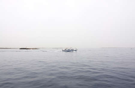 FORMENTERA, BALEARIC ISLANDS, SPAIN - OCTOBER 26, 2016: Port Savina on an overcast day on October 26, 2016 in Formentera, Balearic islands, Spain.のeditorial素材