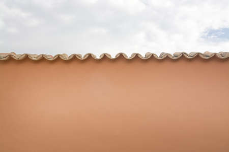 Mallorquin traditional terracotta tiled roof detail copy space texture and skyの写真素材