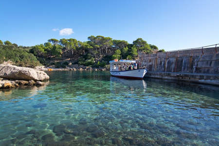 SANT ELM, MALLORCA, BALEARIC ISLANDS, SPAIN - OCTOBER 30, 2017: Ferry Margarita in Dragonera harbor on a sunny day on October 30, 2017 in Sant Elm, Mallorca, Balearic islands, Spain.のeditorial素材