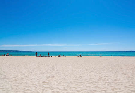 PALMA DE MALLORCA, BALEARIC ISLANDS, SPAIN - MAY 25, 2017: People on Playa de Palma beach on a sunny spring day on May 25, 2017 in Palma de Mallorca, Balearic islands, Spain.のeditorial素材