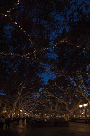 MALLORCA, BALEARIC ISLANDS, SPAIN - NOVEMBER 24 2017: Christmas holiday lights in Palma de Mallorca on a sunny day on November 24, 2017 in Mallorca, Balearic islands, Spain.のeditorial素材