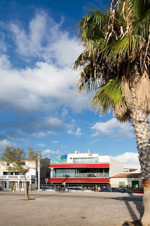 PORTIXOL, MALLORCA, BALEARIC ISLANDS, SPAIN - SEPTEMBER 27, 2017: People out and about along the promenade on a sunny day on September 27, 2017 in Portixol, Mallorca, Balearic islands, Spain.のeditorial素材