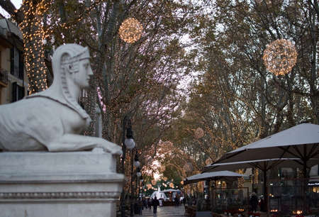 PALMA DE MALLORCA, BALEARIC ISLANDS, SPAIN - DECEMBER 5, 2017: Sfinx at Passeig des Born with evening Christmas light decorations on December 5, 2017 in Palma de Mallorca, Balearic islands, Spain.のeditorial素材