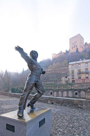 GRANADA, ANDALUCIA, SPAIN - DECEMBER 21, 2017: Alhambra and statue of dancer and coreographer Mario Maya 1936-2008 and Alhambra on December 21, 2017 in Granada, Andalucia, Spainのeditorial素材