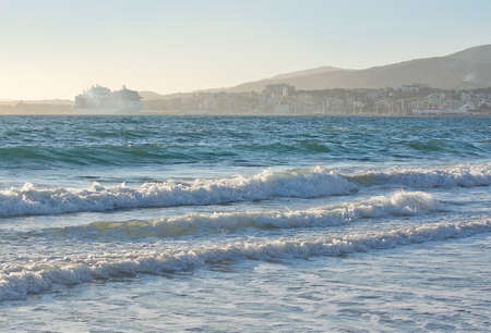 PALMA DE MALLORCA, SPAIN - JANUARY 4, 2018: Passenger ship MSC Meraviglia sailing under Malta flag on a sunny windy winter afternoon on January 4, 2018 in Palma de Mallorca, Spain.のeditorial素材