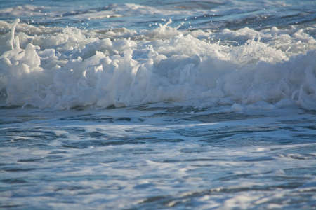 Wild Mediterranean waves on a sunny winter day in January in Mallorca, Spain.