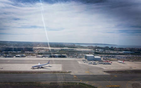 MALLORCA, BALEARIC ISLANDS, SPAIN - APRIL 14, 2016: Aerial view over Palma airport and Can Pastilla with planes on tarmac on takeoff on takeoff on April 14, 2016 in Mallorca, Balearic islands, Spain.のeditorial素材
