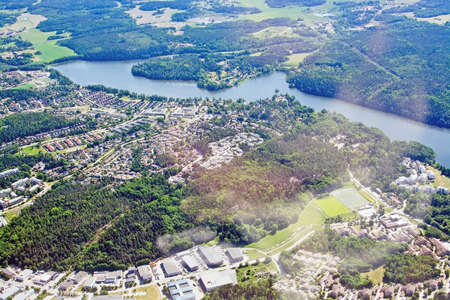 Aerial shot over Stockholm suburbs during inflight to Arlanda airport on a sunny day on June 1,...