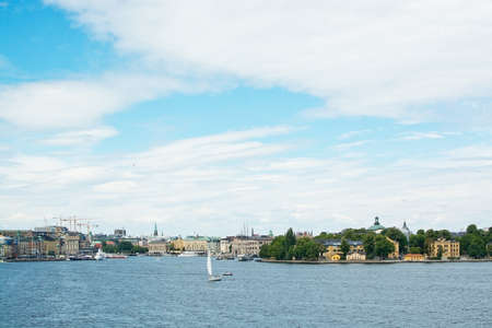 STOCKHOLM, SWEDEN - JULY 11, 2018: Sailboat outside Kastellholmen across the water on July 11, 2018 in Stockholm, Sweden.のeditorial素材