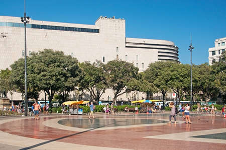 BARCELONA, SPAIN - JULY 31, 2012: View over Plaza Catalunya and El Corte Ingles building on a sunny summer day on July 31, 2012 in Barcelona, Spain.のeditorial素材