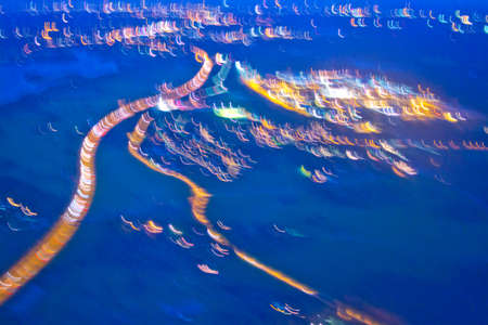 Abstract landscapes with lights from evening flight