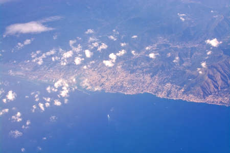 Thick summer storm clouds system cover from above the Mediterranean on a summer day in Mallorca, Spainの写真素材