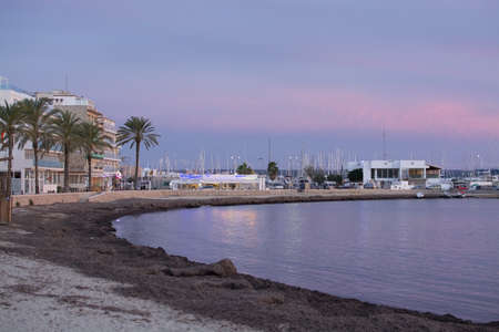 MALLORCA, SPAIN - NOVEMBER 24, 2018 Powdery pink winter sunset skies over Can Pastilla marina on November 24, 2018 in Mallorca, Spain.のeditorial素材