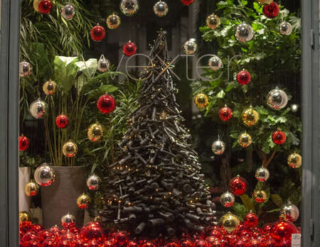STOCKHOLM, SWEDEN - DECEMBER 29, 2018: Christmas decor in window display at Wexter at night on December 29, 2019 in Stockholm, Swedenのeditorial素材
