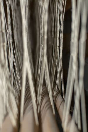 Loom parts and threads closeup selected focus