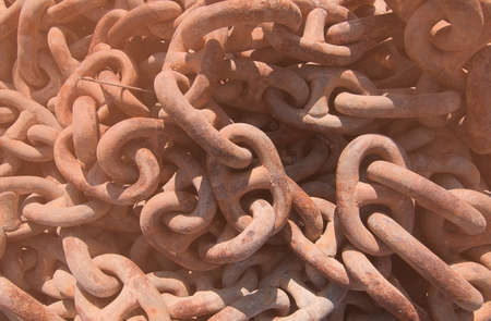 Closeup of rusty boat anchor chains with a tone of Living Coralの写真素材