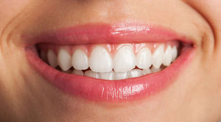 perfect smile with red lips, extreme closeup