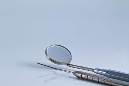 Dental tools and equipment on white background.の写真素材