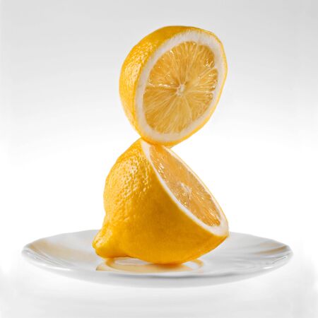  fresh yellow lemon on a white backgroundの写真素材