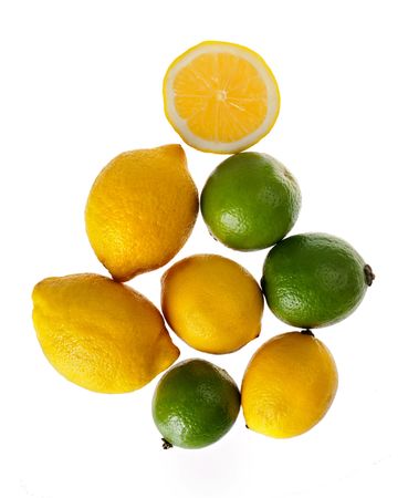  fresh yellow and green lemons on a white backgroundの写真素材