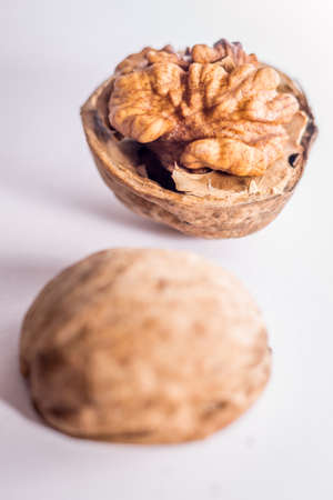 Close up nutmeat and nutshell with shallow depth of field.の写真素材
