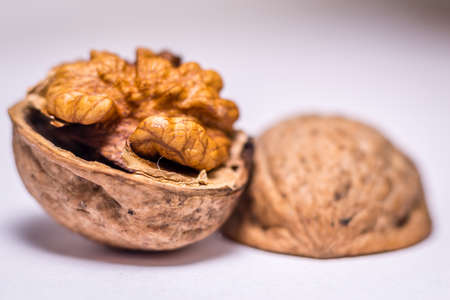 Close up nutmeat and nutshell with shallow depth of field.の写真素材