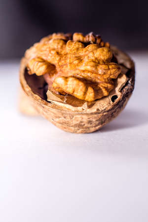 Close up nutmeat and nutshell with shallow depth of field.の写真素材