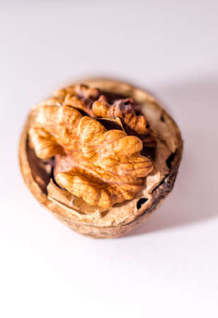 Close up nutmeat and nutshell with shallow depth of field.の写真素材
