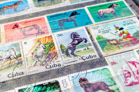 Collection of old postage stamps from different countries and themesのeditorial素材