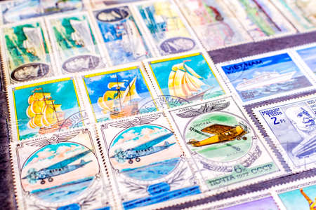 Collection of old postage stamps from different countries and themesのeditorial素材
