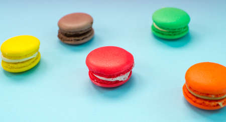 Close-up shot of colored macaroons in different positionの写真素材