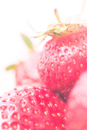 Cup of retro looking vibrant delicious strawberries