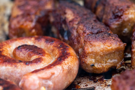 Traditional Romanian food called "mici" which consist of pork meat rollsの写真素材