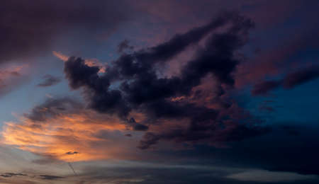 Expressive dramatic cloudscape with vibrant colorsの写真素材