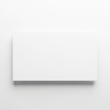 A simple, white rectangular object floating against a plain white background, creating a sense of calm and simplicity.の素材