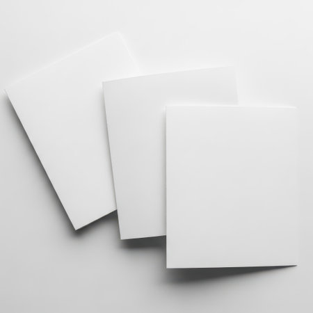This image features a stack of white paper sheets neatly arranged on a transparent background. The minimalist composition highlights the simplicity and purity of the white paper against the clean, white backdrop. Ideal for design and stationery themes.の素材