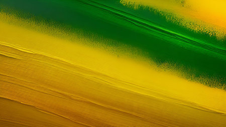 Abstract background of yellow, green and yellow paint strokes on the canvasの素材