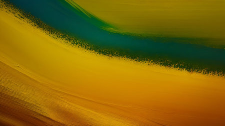 Abstract background of oil paint in yellow, green and blue colors.の素材