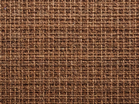Closeup detail of brown fabric texture background. High resolution photo.の素材