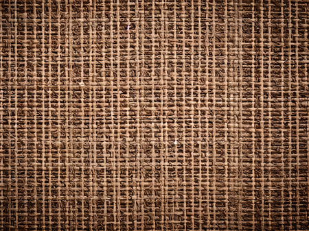 Old burlap texture for background. Brown color. Toned.の素材