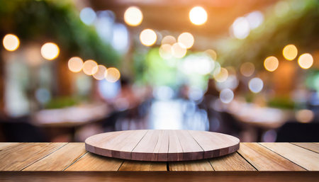 Empty wood table and Coffee shop blur background with bokeh image.の素材