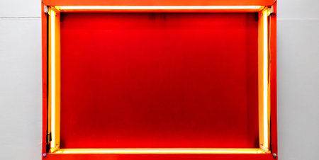 Red neon light on white wall. Abstract background and texture for design.の素材