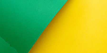 Colored paper background in green and yellow tones. Copy space.の素材