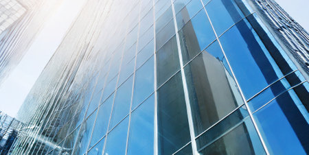 Bottom view of modern skyscrapers, business concept of successful industrial architectureの素材