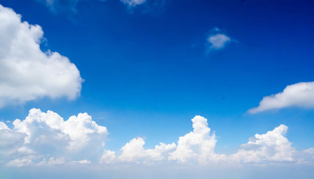 Blue sky background with tiny clouds, blue sky background and tiny cloudsの素材