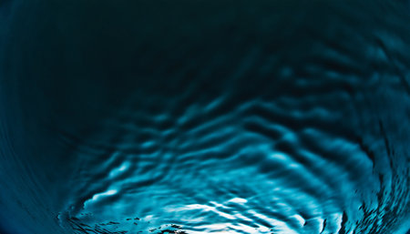 abstract blue water background with ripples and waves, macro photoの素材