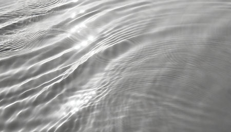 Water ripples on the water surface. Black and white background.の素材
