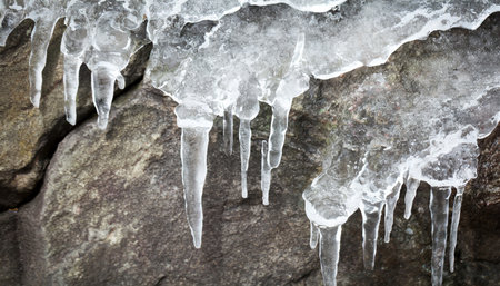 frozen ice on stone backgroundの素材