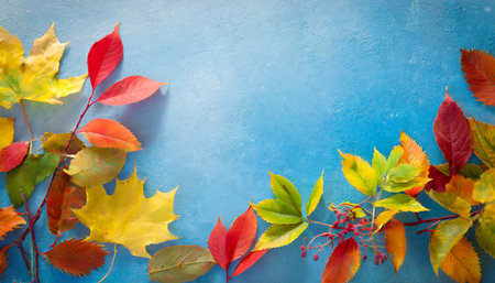 autumn background with colored leaves on blue background generative aiの素材
